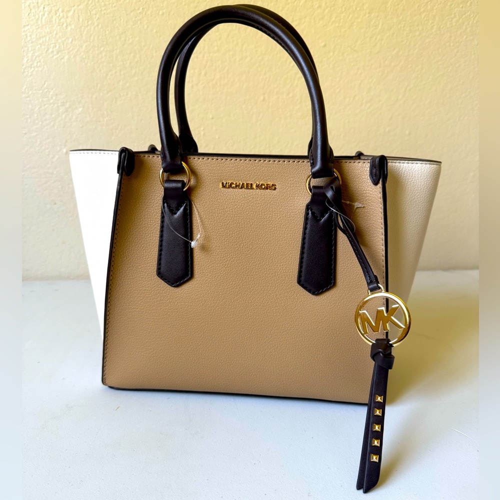 Michael Kors Tan, White, Dark Brown Exterior, interior is Beige.